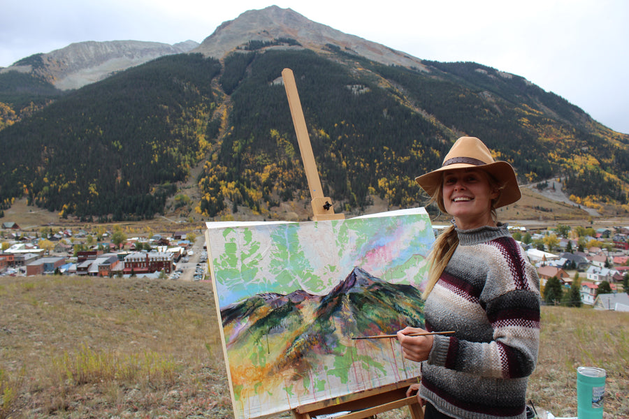 Hannah Wilson with mountain painting