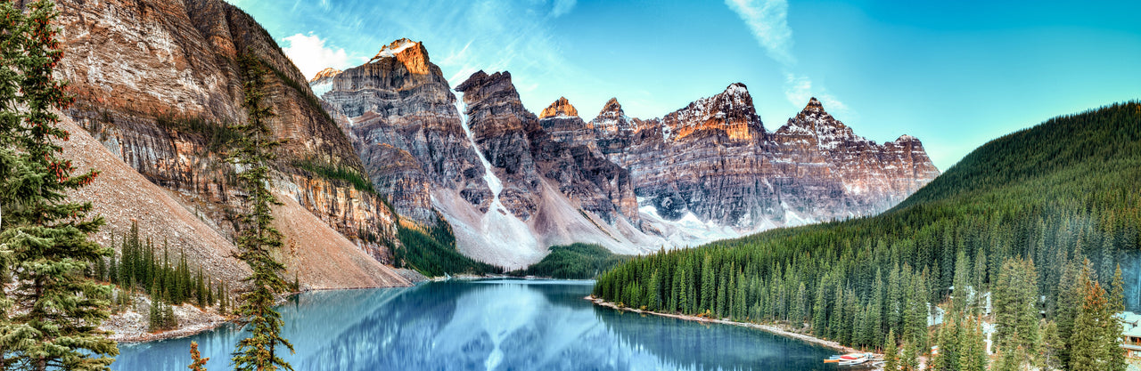 Scenic view of Rocky Mountain peaks and Moraine Lake with turquoise glacial water