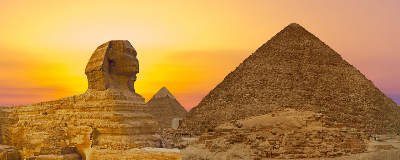 Sphinx against the backdrop of the great Egyptian pyramids