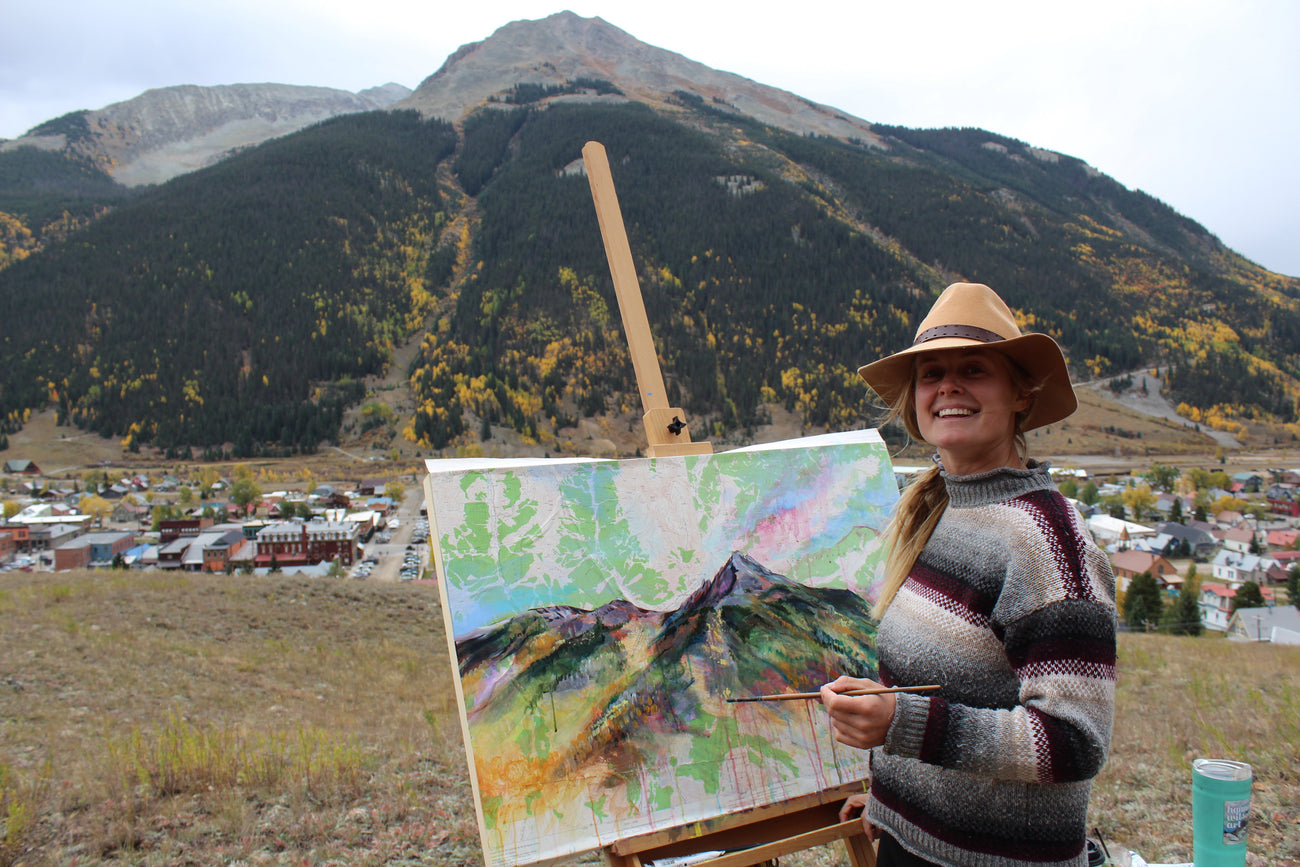 Hannah Wilson with map painting