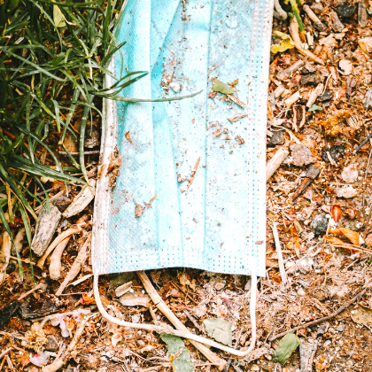 Disposable mask outside on the ground