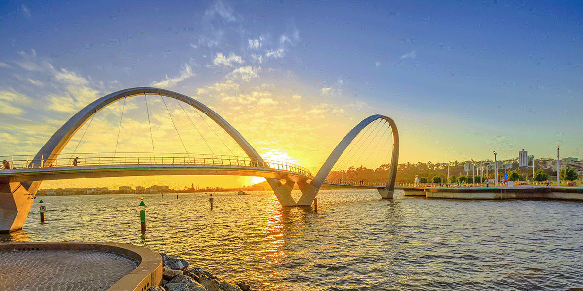 Scenic and iconic Elizabeth Quay Bridge at sunset light on Swan River 