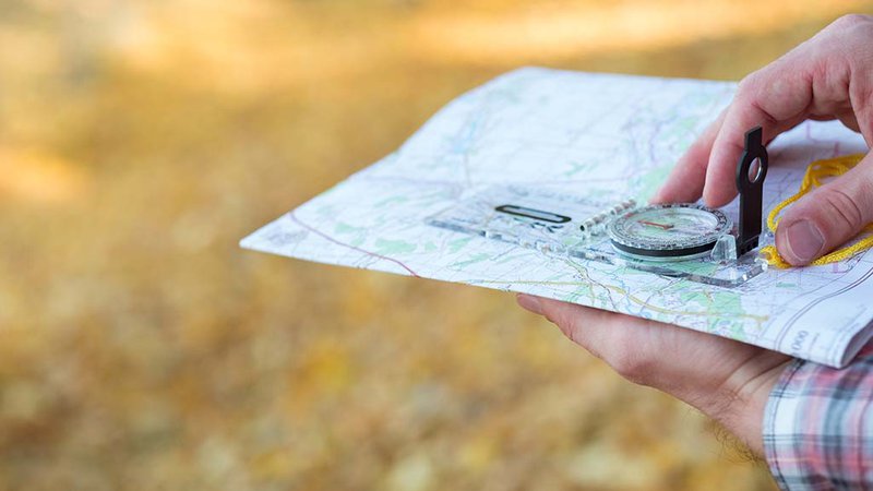 Orienting a map with a compass