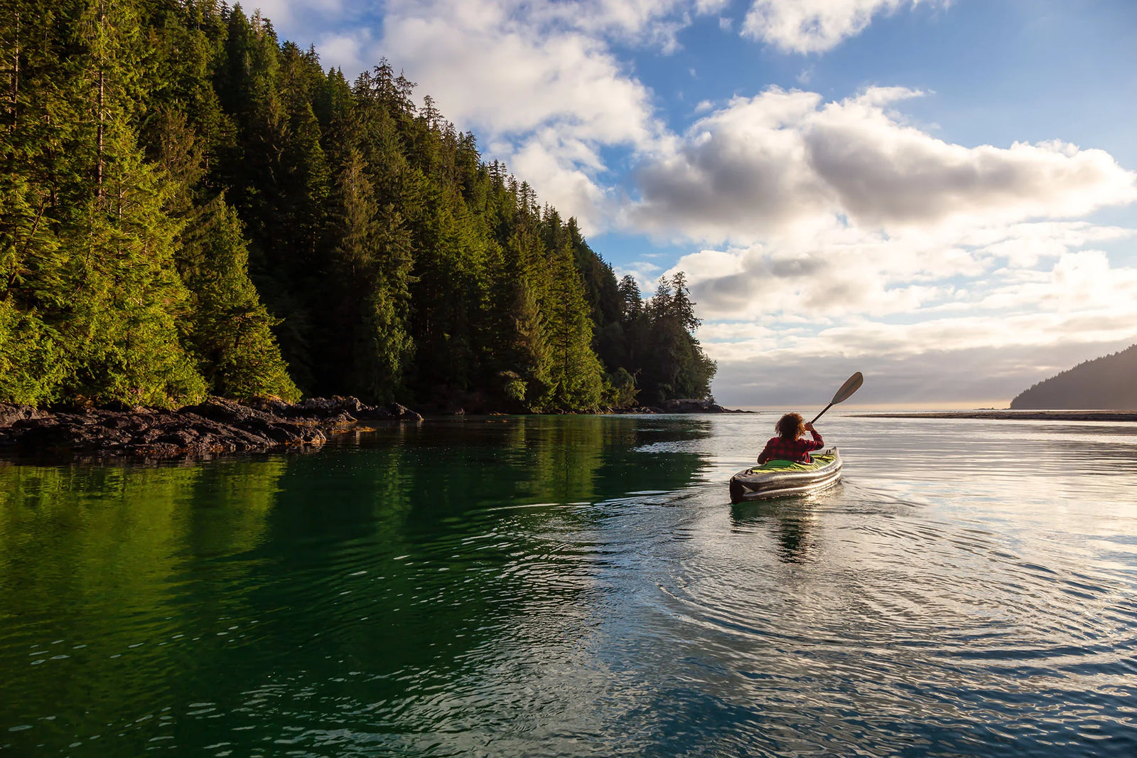 Woman kayaking near Vancouver Island, British Columbia